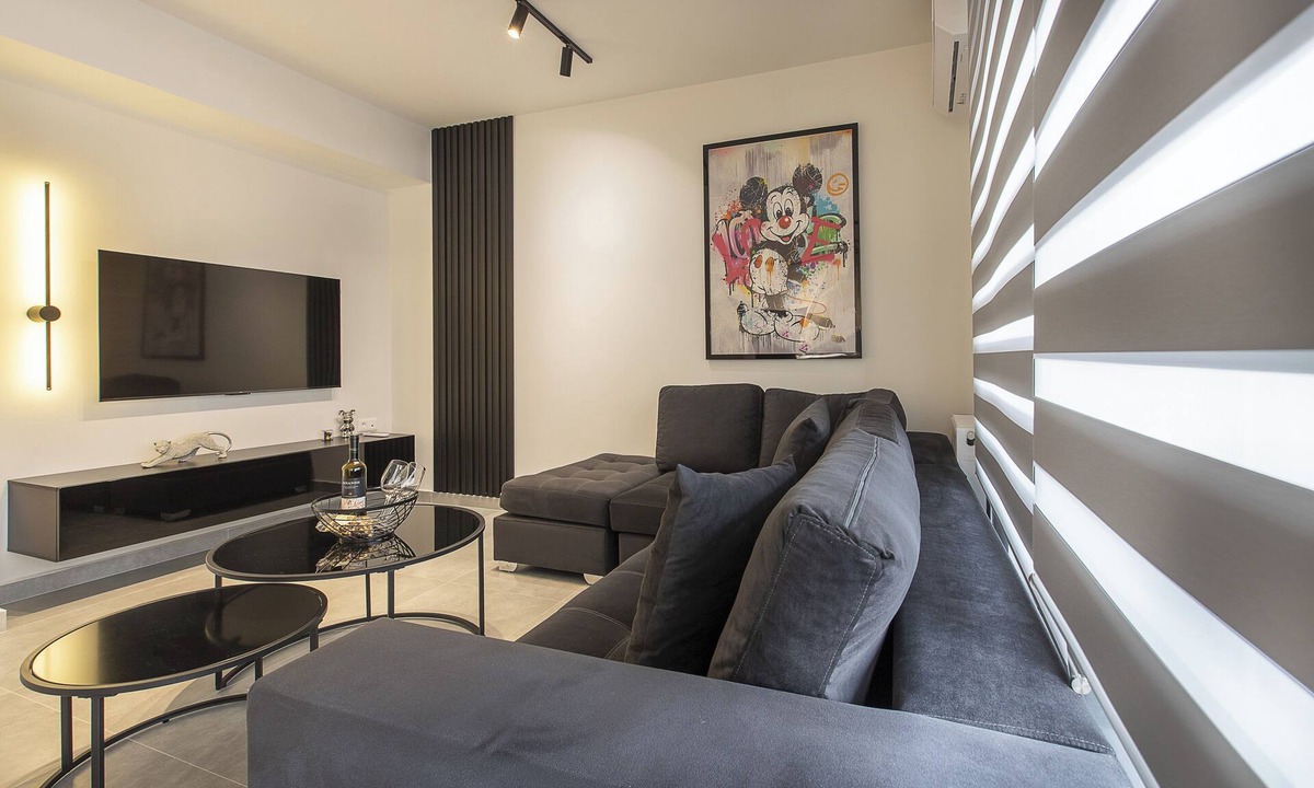 Ilisia Apartment | Black & White 2BR Apt steps from Mavili Square