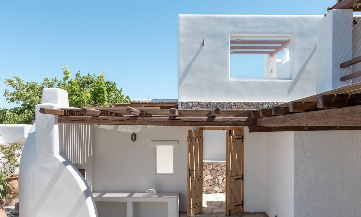 Vourvoulos Apartment | Santorini Suite with Jacuzzi 3 by Delfus