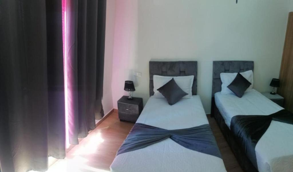 Agdal Apartment | Un élégant appartement meublé à louer à Marrakech avec deux piscines et une vue magnifique