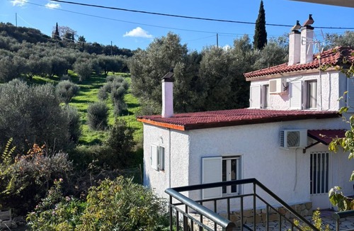 Eliki Cottage | Δωμάτια Εξοχή-With fireplace and view to the sea