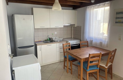 Amarinthos Apartment | Beach House in Amarynthos with Direct Sea Access