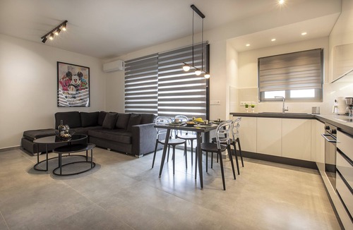 Ilisia Apartment | Black & White 2BR Apt steps from Mavili Square