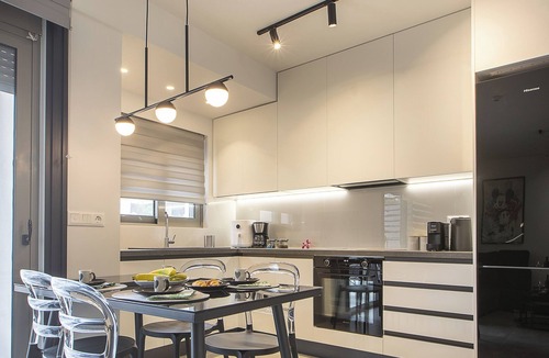Ilisia Apartment | Black & White 2BR Apt steps from Mavili Square