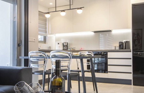 Ilisia Apartment | Black & White 2BR Apt steps from Mavili Square