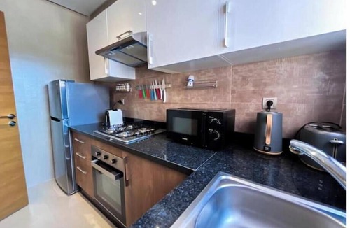 Mouassine Condo | Cozy & Chic 2-Bedroom Pool-View Apartment at Prestigia Saphir