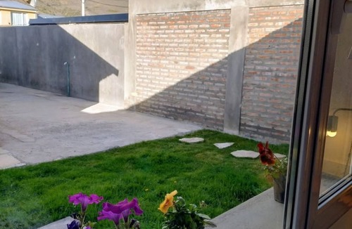 Esquel Apartment | Flamencos Apart Apartment warm and modern.
