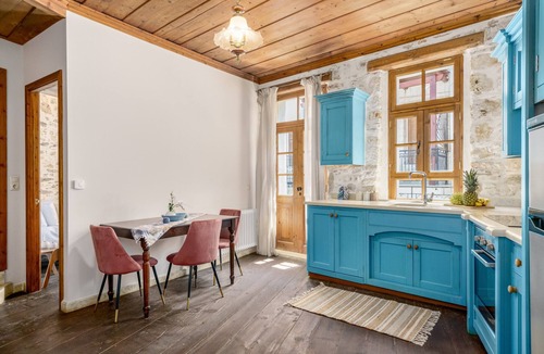 Panormos Villa | Kamares Villa, a 1912 stonebuilt estate with heated pool!