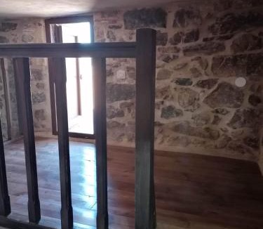 Omales House | panos stone tower