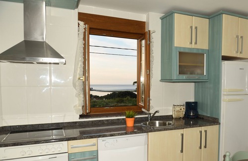 Mogro Apartment | Rural apartment facing the beach with swimming pool and paddle tennis court.