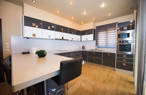 Kontos Apartment | Sea-view apartment in private villa with pool, gardens and modern comfort