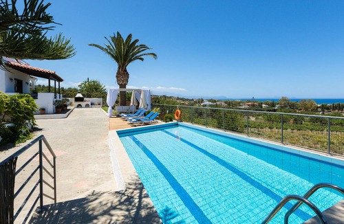 Adelianos Kampos Villa | Sea view, full privacy, walking distance to a sandy beach and shops!