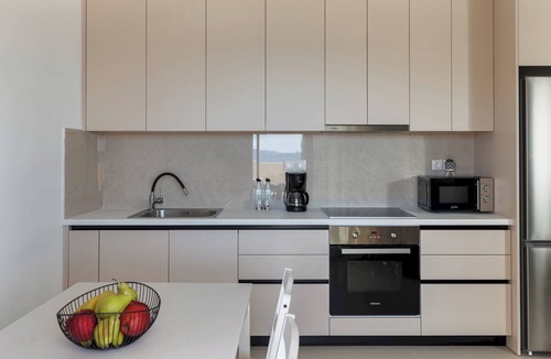 Nea Alikarnassos Apartment | Sea Whisper Seafront Home with Hot Tub, by Estia