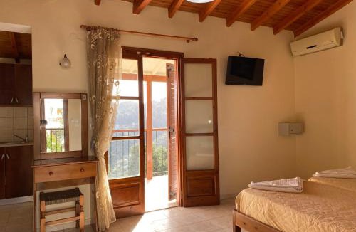 Katsarou Apartment | Valmas Village Apartments pool&bar