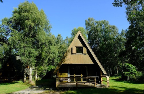 Beauly Ski Chalet | Woodland cottage nestled in woods on the banks of a glorious Highland River
