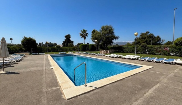 Idyllic apartment steps from the beach with mountain views in Son Servera