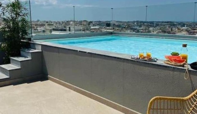 New Modern 2BD aprt with shared rooftop pool B2