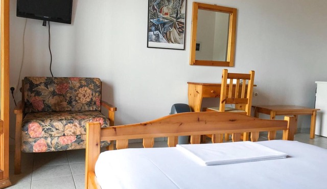 Studio Apartment 'Hotel Antigoni - Double Room 1' with Lake View, Wi-Fi and Air Conditioning