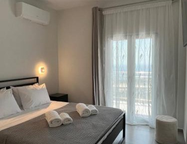 One-Bedroom Apartment with Balcony and Sea View