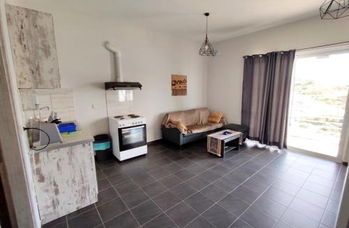 Agii Apostoli House | Aegean Beachfront Apartments